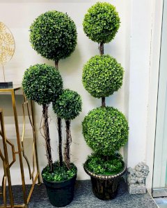 Artificial glass ball in pot